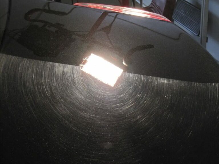 black car polishing swirl marks